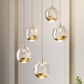 Lucande LED-es függőlámpa Hayley, Ø 30 cm, 5 lámpás, arany, üveg kép