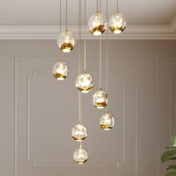 Lucande LED-es Hayley függőlámpa, Ø 40 cm, 9 lámpás, arany, üveg kép